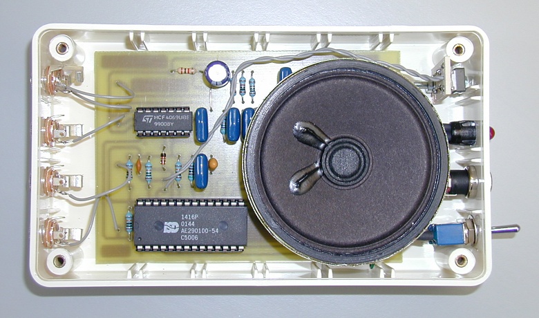 The PCB, speaker, connectors and switches inside the box The PCB, speaker, connectors and switches inside the box