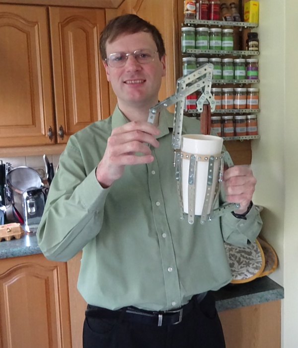 Me holding the Dunkin’ Mug