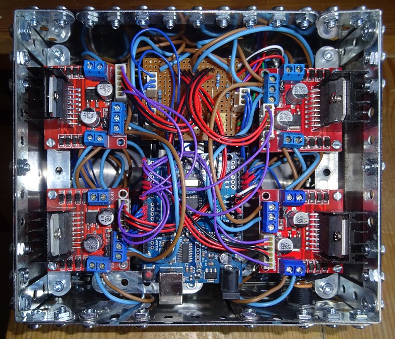 The underside of the Meccano box showing the physical layout and wiring of the electronics The underside of the Meccano box showing the physical layout and wiring of the electronics