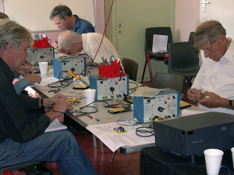 West London Meccano Society members working on their circuits West London Meccano Society members working on their circuits