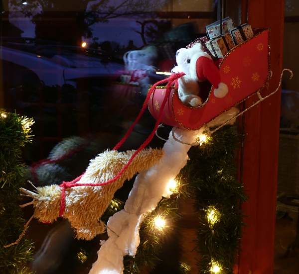 Santa Bear in his sleigh pulled by Rudolph Santa Bear in his sleigh pulled by Rudolph