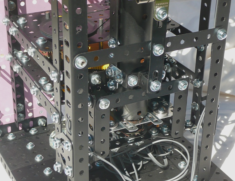 The coin dispensing mechanism inside the right-hand tower
